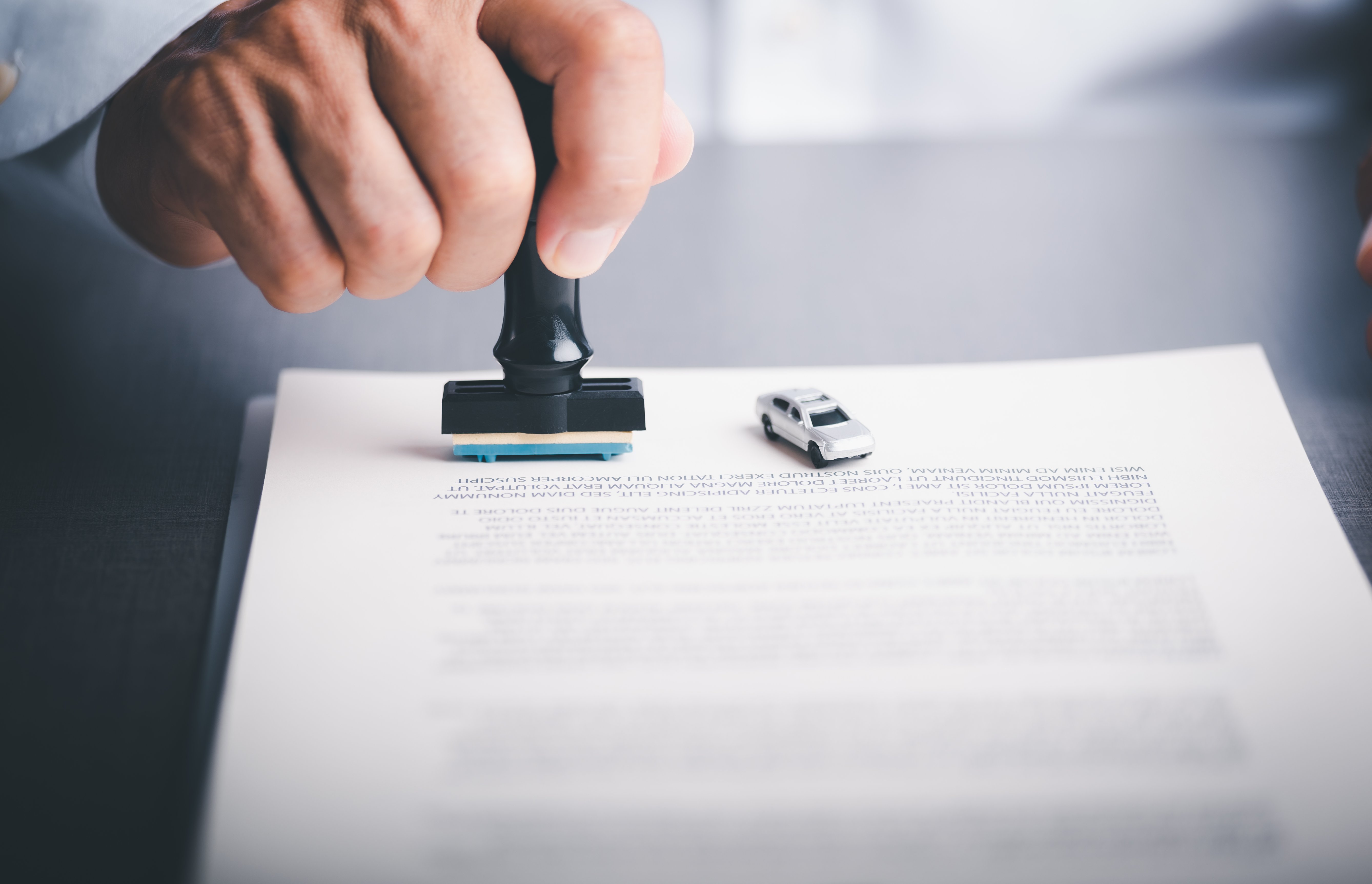 vecteezy_business-people-stamp-on-the-contract-documents-at-the-desk_11845339-1